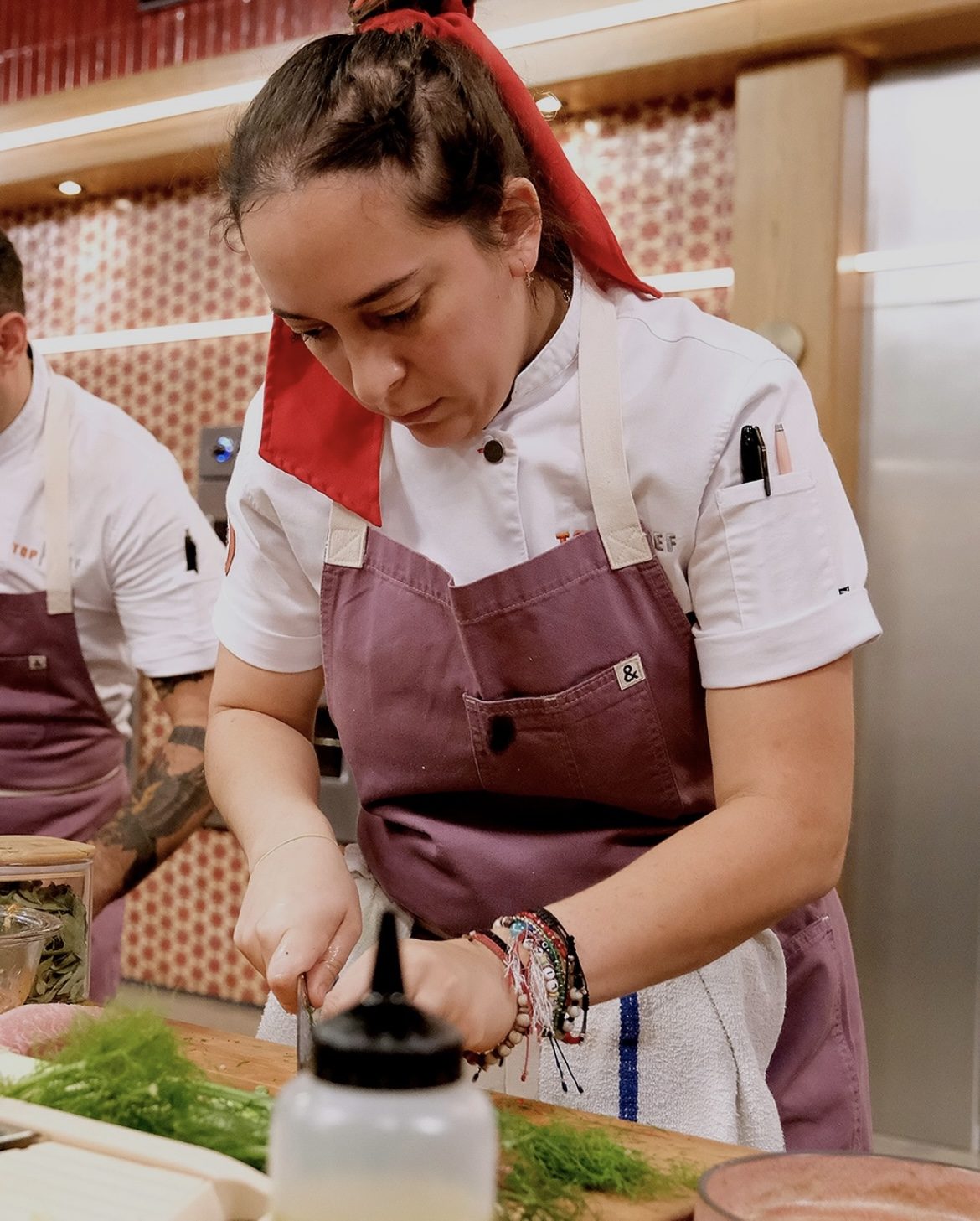 Chef Paula Endara plating during her Top Chef season