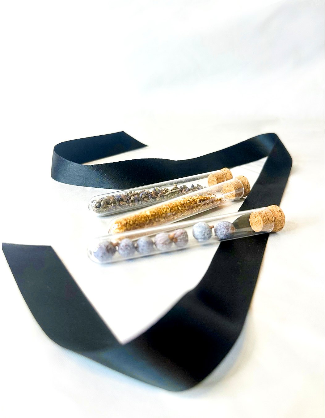 Sip & Smell botanical test tubes — juniper, orange peel, and lavender — with ribbon